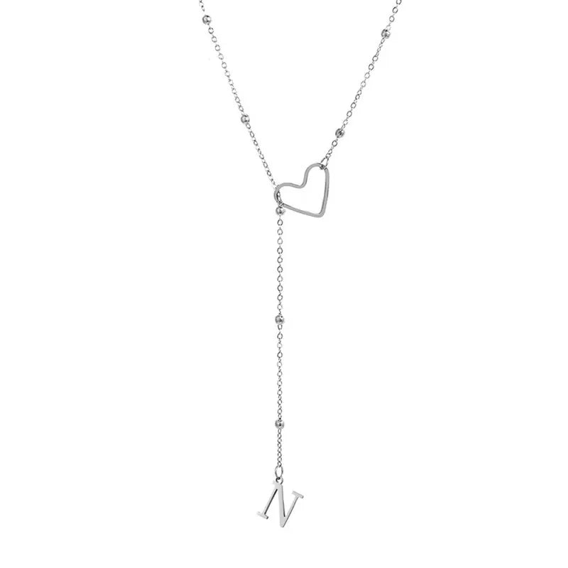 Y alakú nyaklánc kezdőbetűvel és szívvel